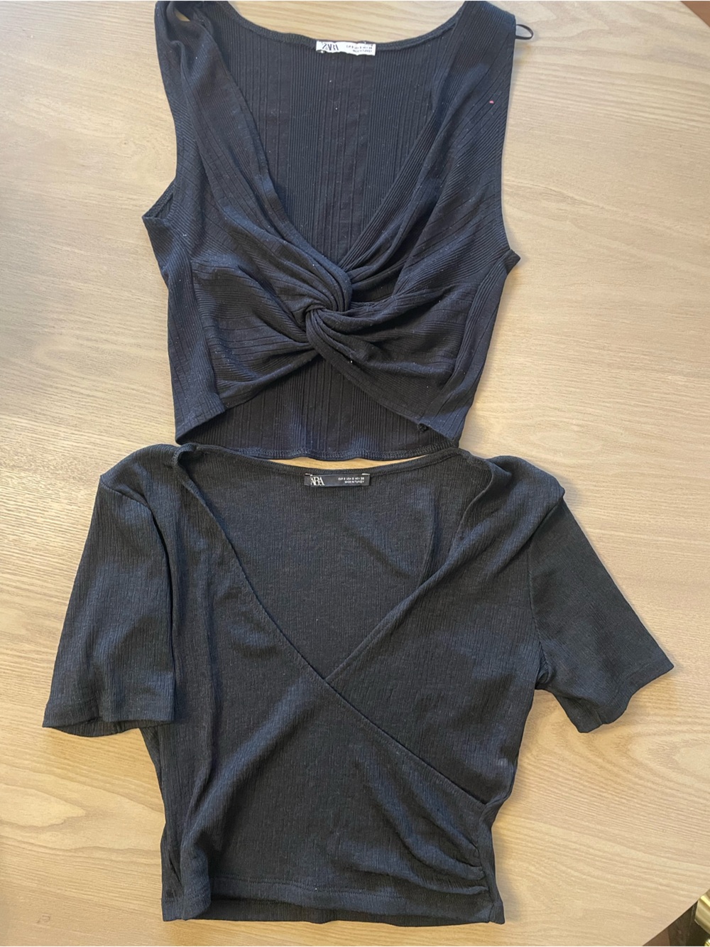 Two Black Low V Front Tops